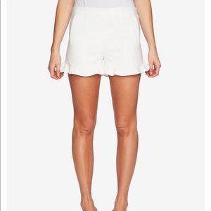 Ruffle Hem Flat Front Shorts